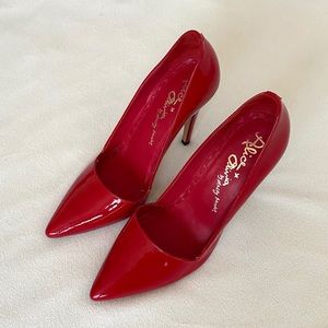Alice and Olivia Dina pump in red patent leather.